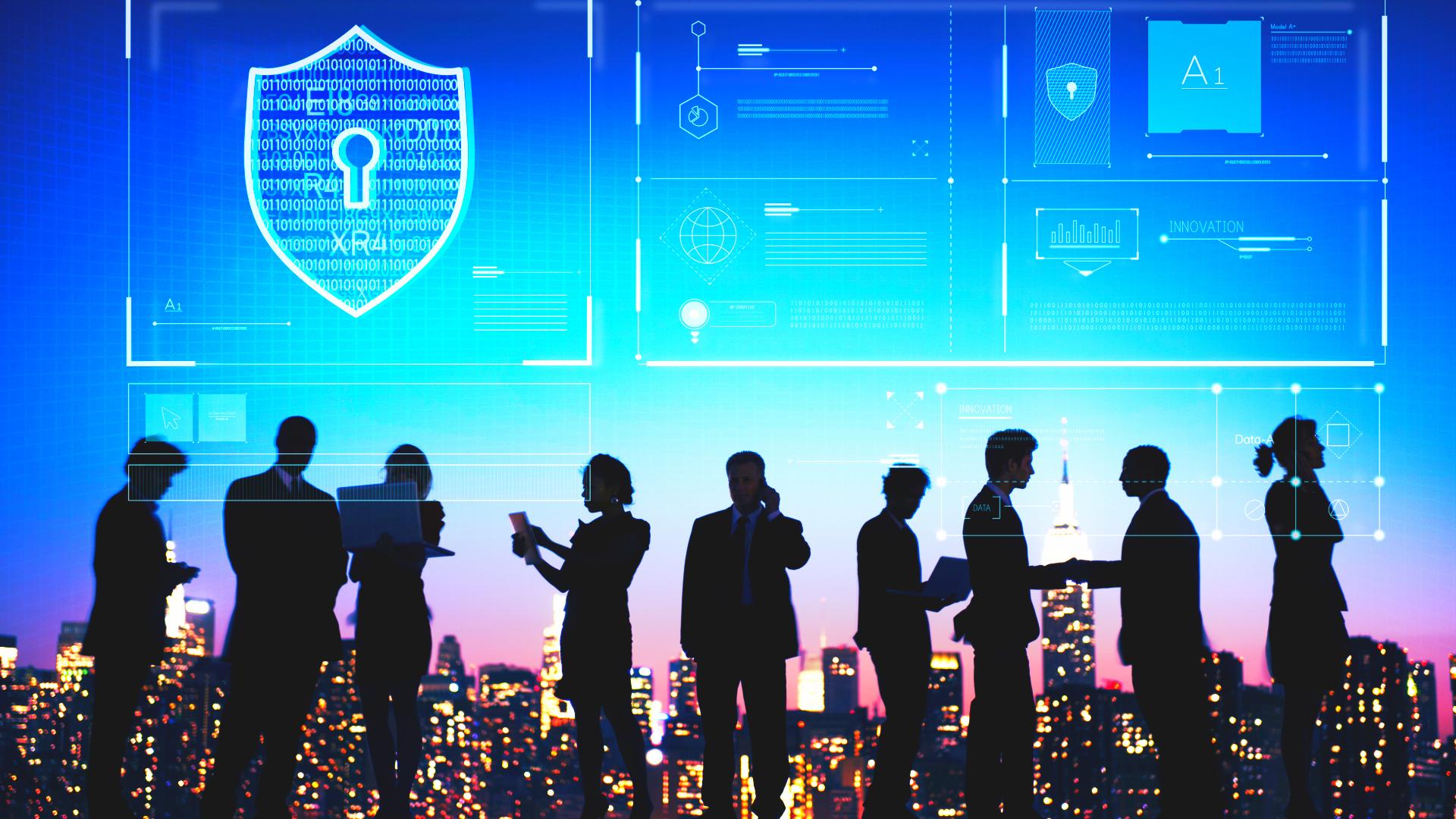 Silhouetted business professionals discussing cybersecurity risks in 2024 with a digital shield and cybersecurity statistics overlay