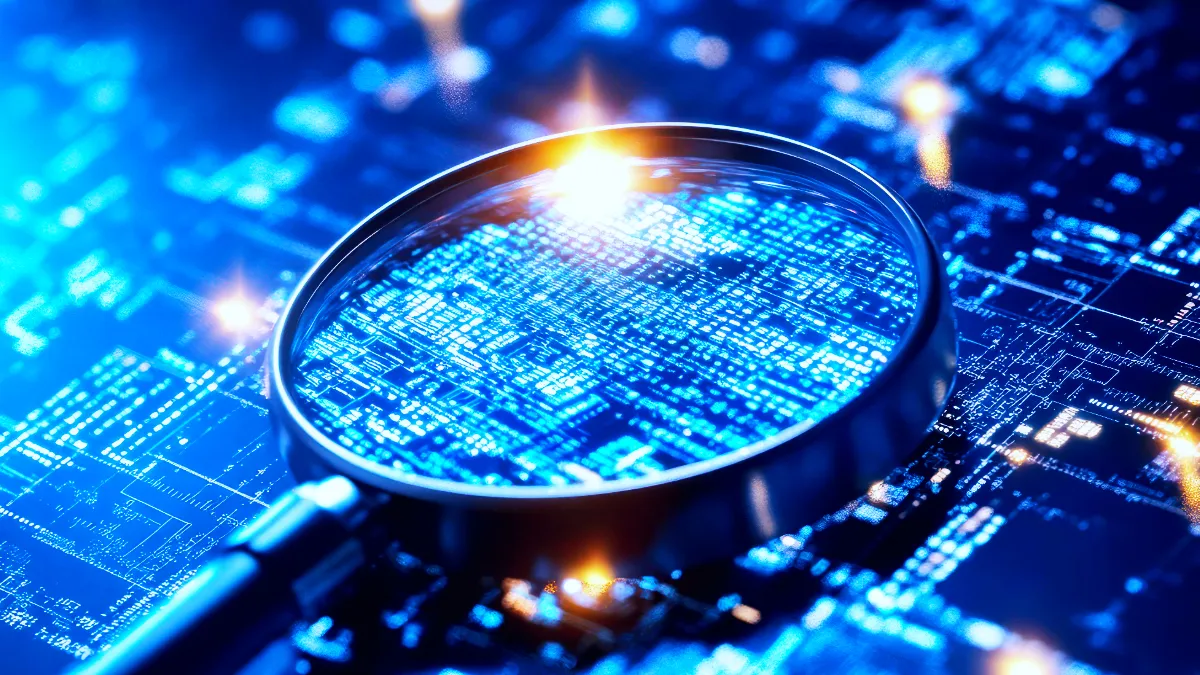 Magnifying glass over a digital data network representing continuous monitoring and proactive security for MSSPs using Travis ASM.