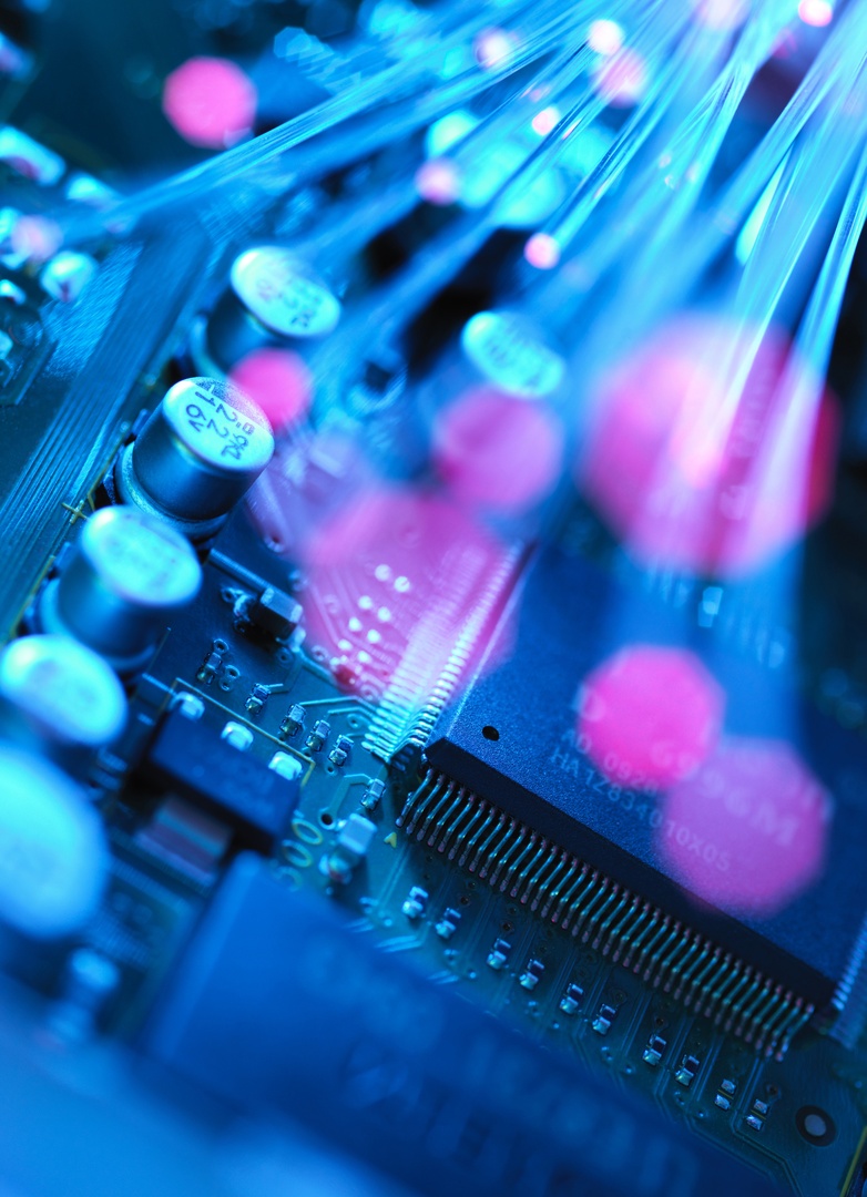 For Shoppers: Tips to Shop Safely Online - Glowing Fiber Optics Representing Data Security Close-up of glowing fiber optic cables, symbolizing secure online shopping and data protection during the holiday season.