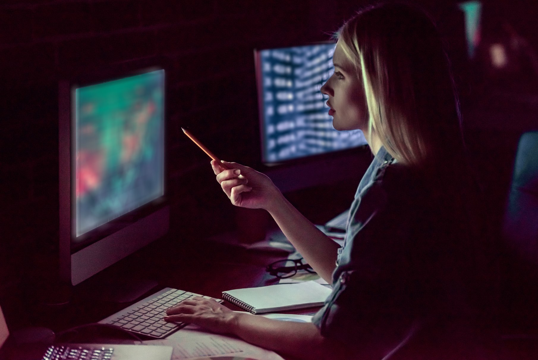 Image of woman using TRaViS ASM for comprehensive external attack surface visibility and data enrichment.
