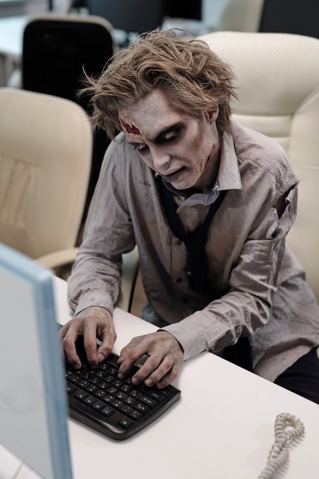 Shadow IT issues can be caused by those in plain site. Image of zombie mindlessly signing up a company with third party applications that do not follow company privacy and security policies.