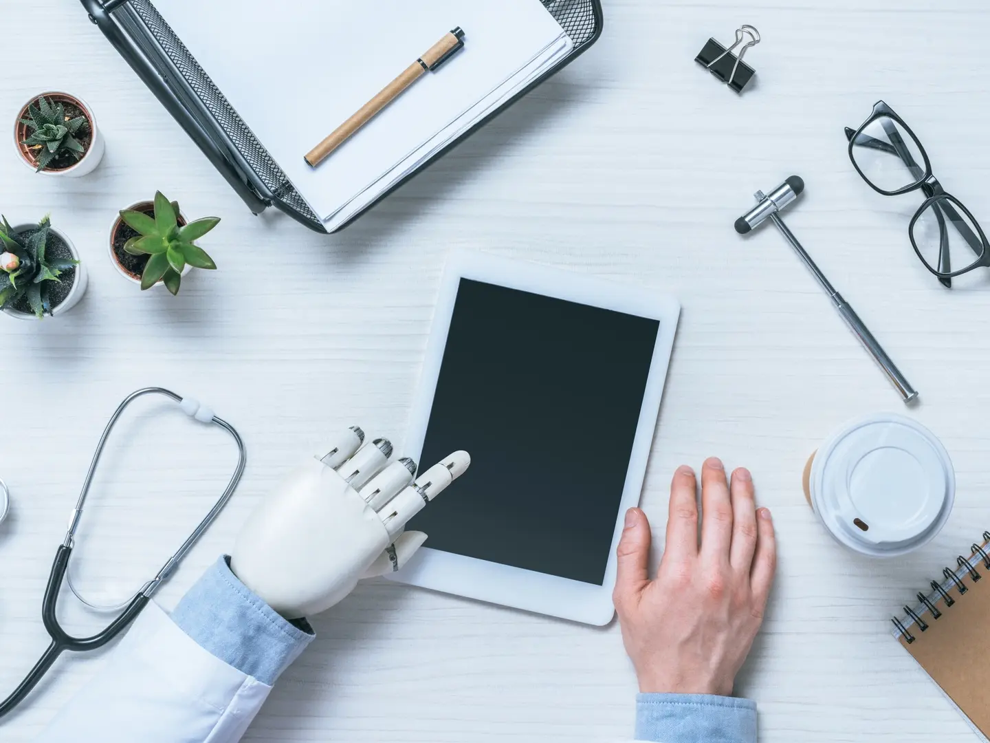 Picture of a tablet on a desk in a healthcare office.